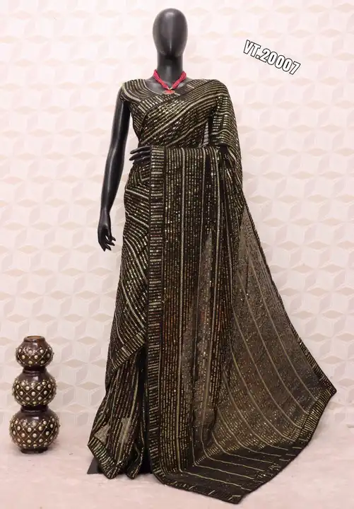 

*SAREE DETAIL*
SAREE FABRIC  : HEAVY GEORGETTE
SAREE WORK    : HEAVY SEQUNCE AND THREAD WORK
SAREE uploaded by Vishal trendz 1011 avadh textile market on 3/23/2023