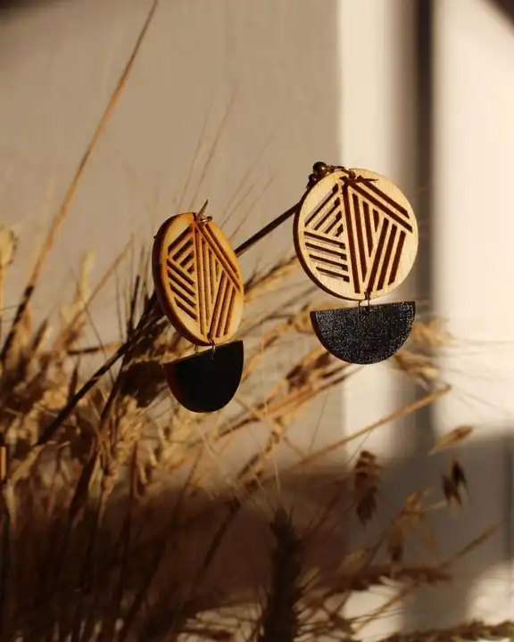Wooden earrings  uploaded by Berlin india on 3/24/2023
