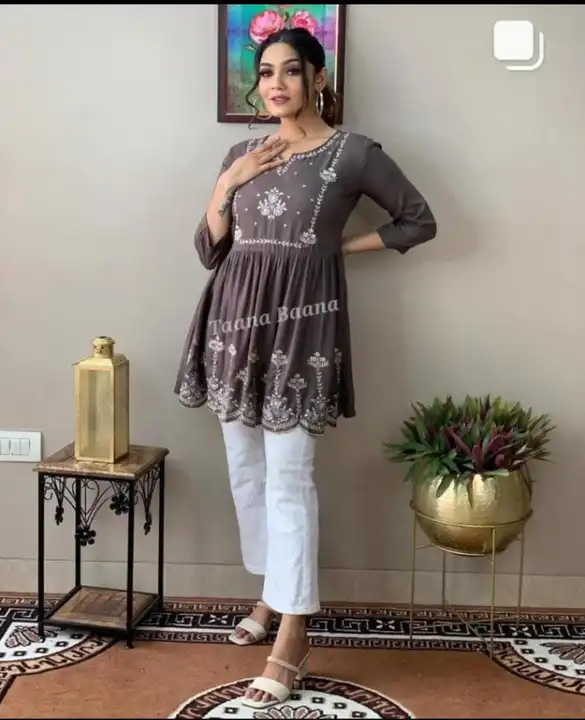 NEW LAUNCH ❤️❤️
    SUPERB QUALITY 
FABRIC RAYON 
💕💕 GET CASUAL WITH THIS PEMPLUM STYLE TOP WITH T uploaded by Gotapatti manufacturer on 3/24/2023