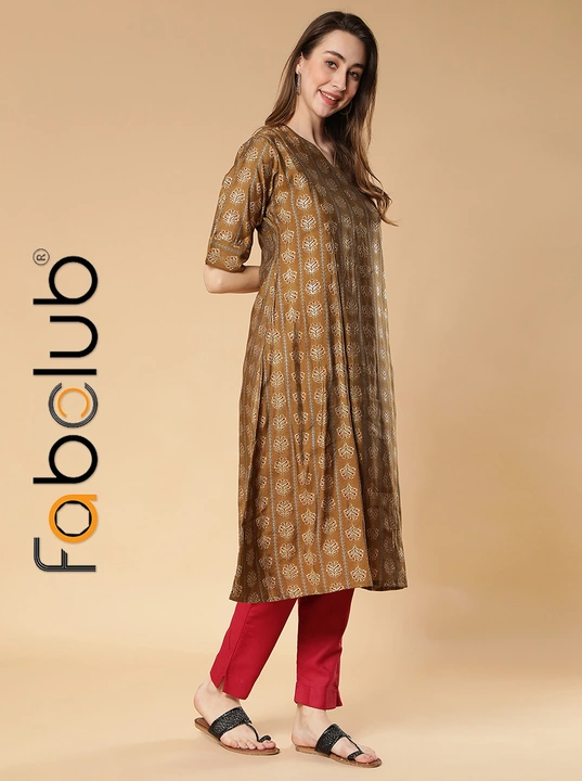 Modal Silk Gold Printed Mustard Yellow A-Line Women Kurti With Trouser Pant uploaded by Fab Creation on 3/25/2023