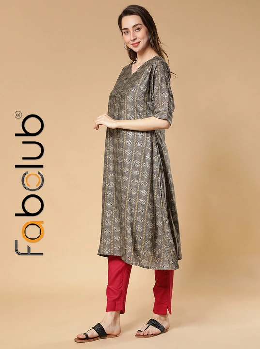 Modal Silk Gold Printed Grey A-Line Women Kurti With Trouser Pant uploaded by Fab Creation on 3/25/2023