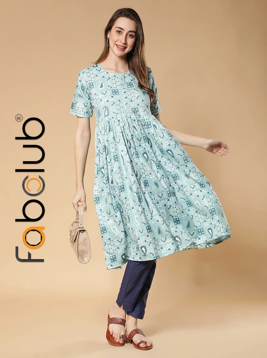 Rayon Gold Printed Light Blue Anarkali Women Kurti With Trouser Pant uploaded by Fab Creation on 3/25/2023