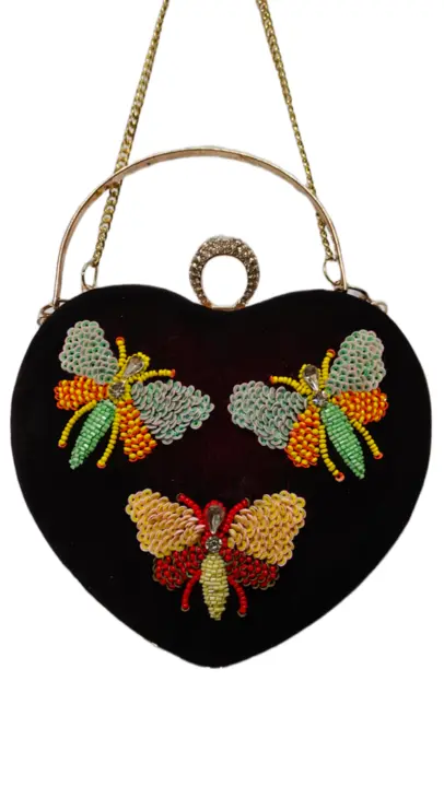Trendy stylish modern butterfly Handwork embellished heart'clutch  uploaded by Lemonius Pearls on 3/25/2023