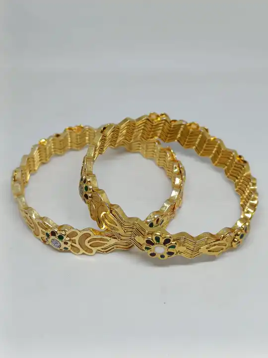Golden meenakri bangles uploaded by Rajasthani juwelen14 on 5/30/2024