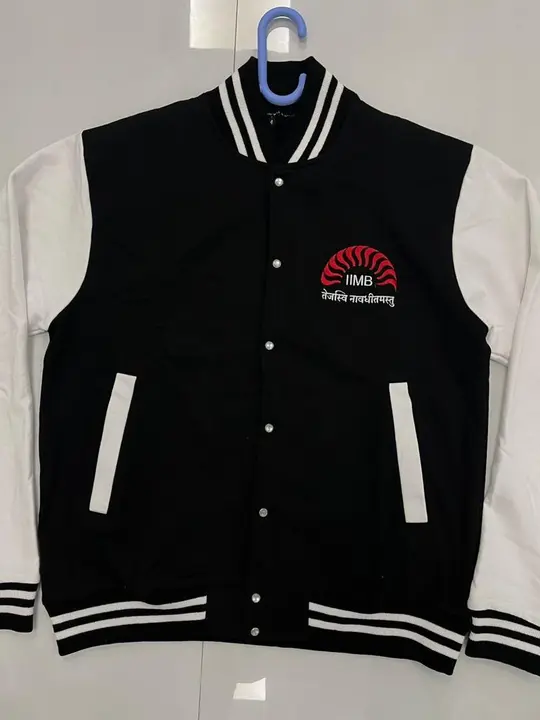 Black and white varsity jacket(customisable) uploaded by business on 3/27/2023