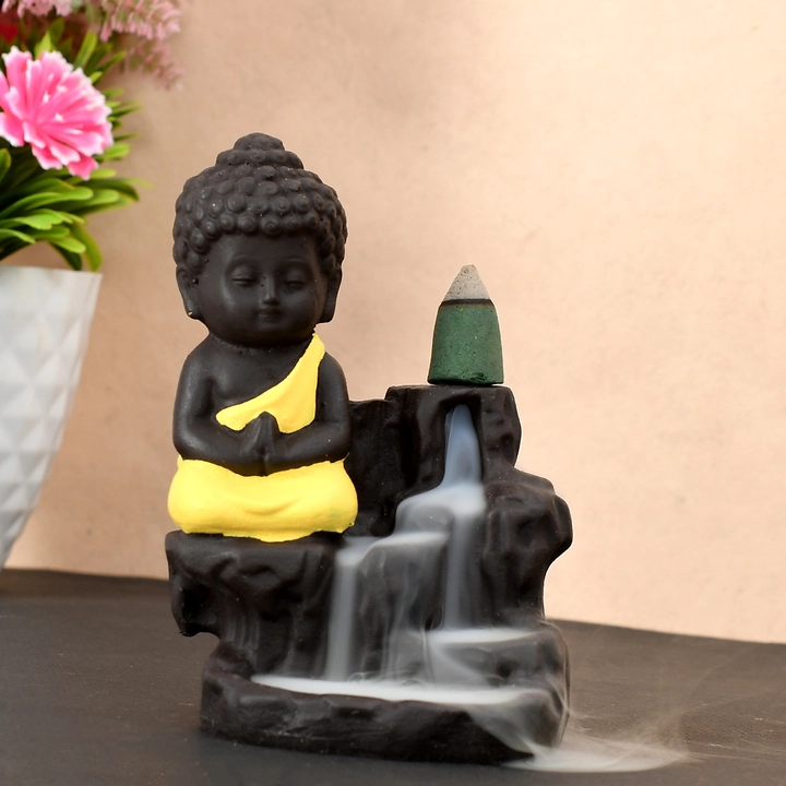 Smoke Buddha fountain in yellow uploaded by Smart fashion deal on 3/30/2023