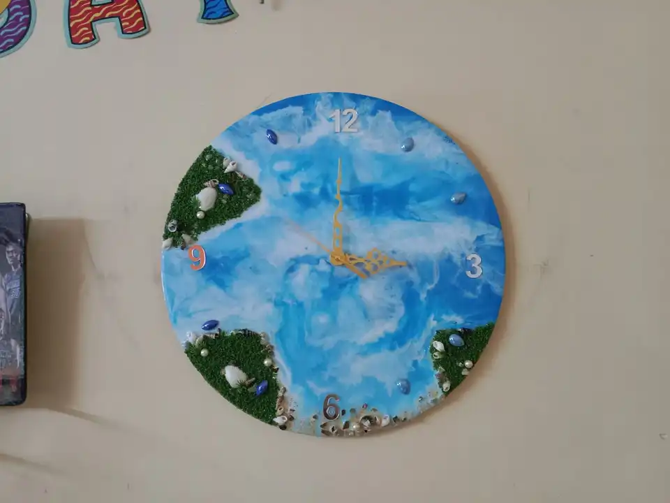Resin wall Clock 021405. uploaded by Kesarpati Creation on 3/30/2023