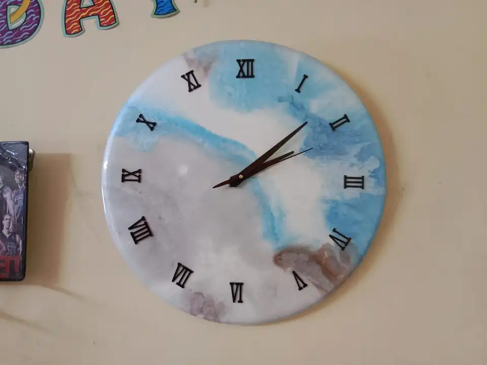 Resin wall Clock 031620. uploaded by business on 3/30/2023