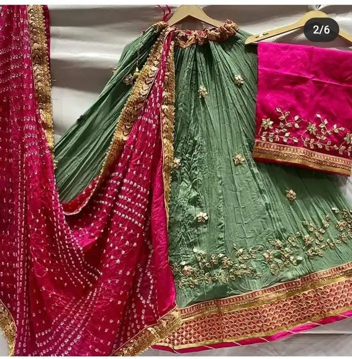 😍😍new launch 
Nice chinon crap full stitched lhnga waist 42 length 41 with bful silk hand bandhej  uploaded by Gotapatti manufacturer on 3/30/2023
