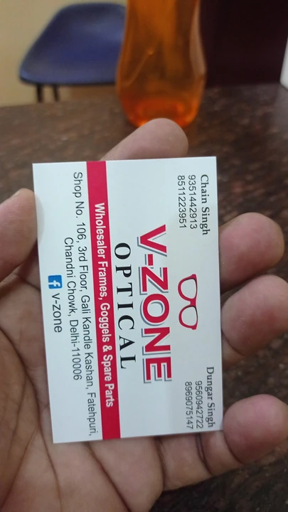 Visiting card store images of V Zone Opticals Delhi