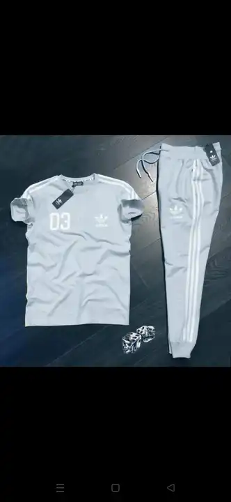 Track suit uploaded by Dk callection on 4/2/2023
