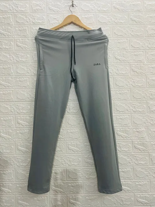 Track pants for man uploaded by HOTSHOTS @ FABRIC. GARMENTS MANUFACTURER LIMITED  on 4/2/2023