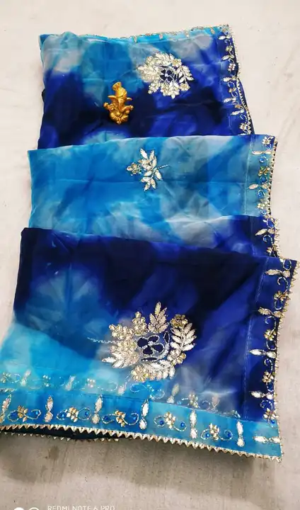 New launched⚡⚡⚡
This ❄⛄Winter Special Organza  Handwork Sarees

⚡organza Soft Fabric in Beautiful pa uploaded by Gotapatti manufacturer on 4/2/2023
