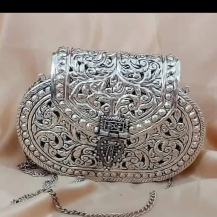 Antique silver clutch  uploaded by RADHIKA HANDICRAFT on 4/3/2023