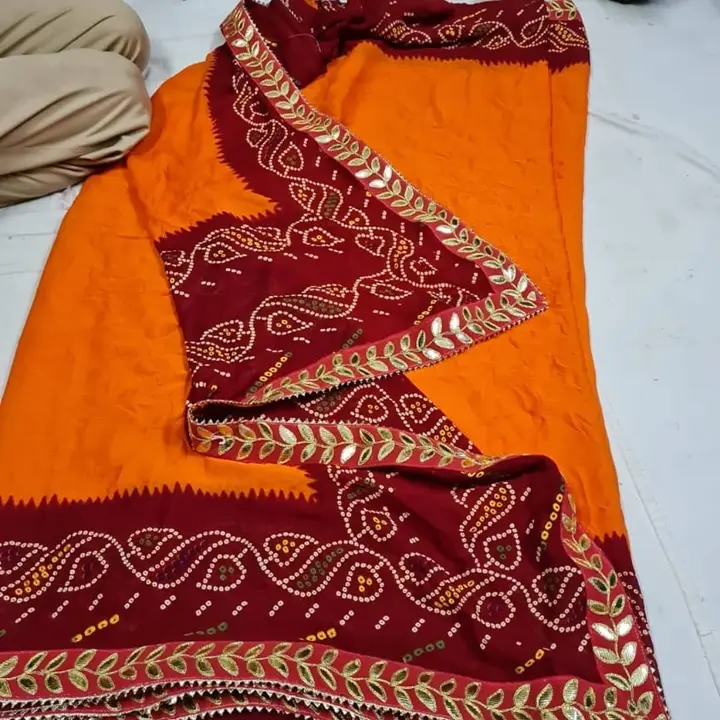 New design 🥰🥰
👉🏻Georgette chunri bandhej saree😍
👉🏻 running blouse with border 
👉🏻With gota  uploaded by Gotapatti manufacturer on 4/7/2023