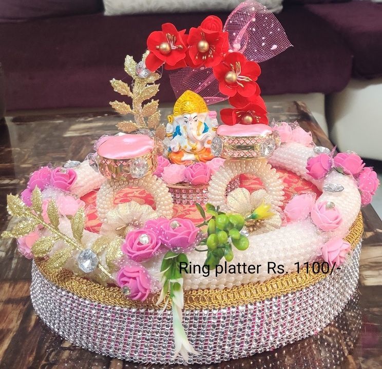 Post image We r manufacturer of Handmade wedding ceremony stuff like backdrop, haldi platter, ring platter,  laddoo gopal ji singhasan or jhulla, home decor stuffs etc.