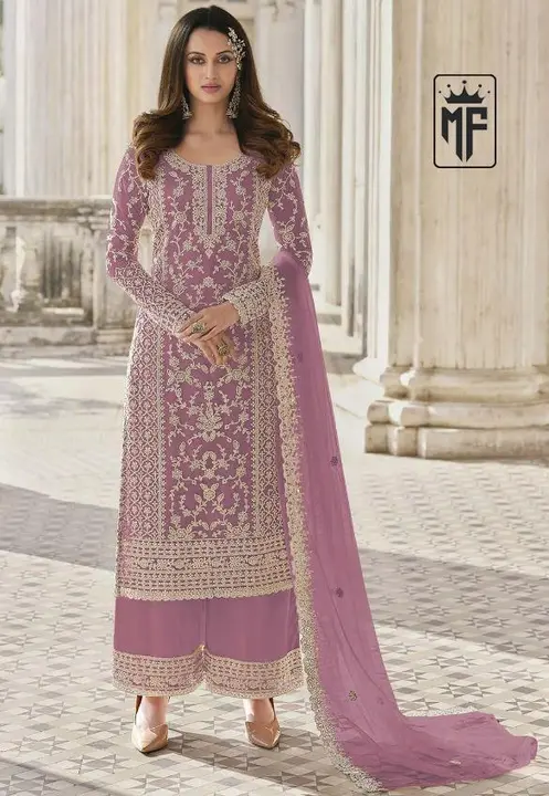 Suit uploaded by Taha fashion online store on 4/9/2023