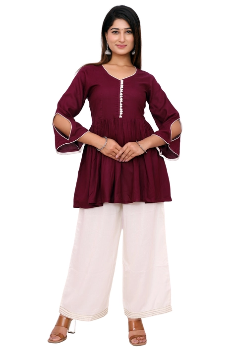 Maroon top white plazzos potli button stylish western best quality  uploaded by business on 4/10/2023