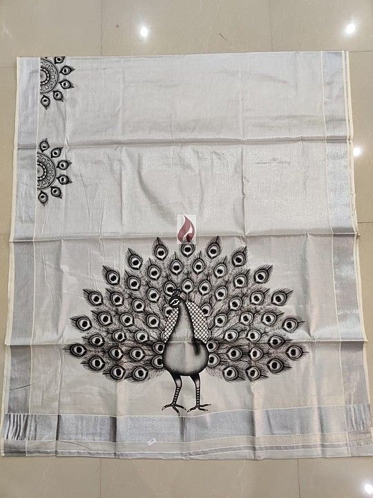 Silver tissue sareee with big mayil print uploaded by business on 7/11/2020
