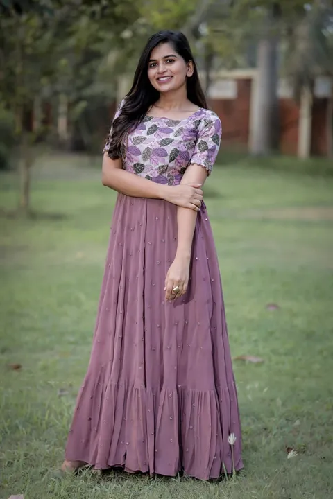 This beautiful Georgette maxi 😘has flare full of mirror 🪞 work  uploaded by Fatema Fashion on 4/10/2023