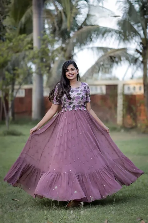 This beautiful Georgette maxi 😘has flare full of mirror 🪞 work  uploaded by Fatema Fashion on 4/10/2023