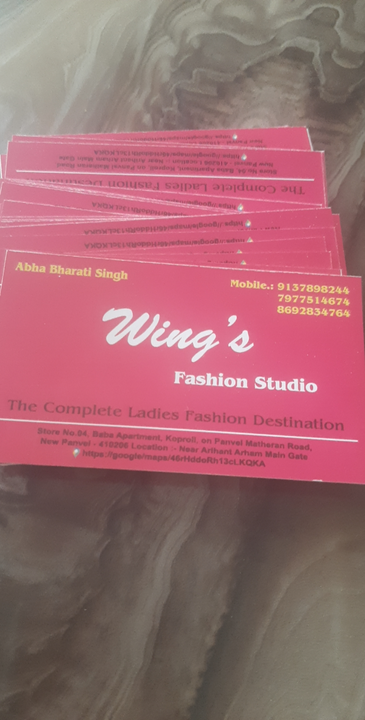 Visiting card store images of Wings Fashion Studio