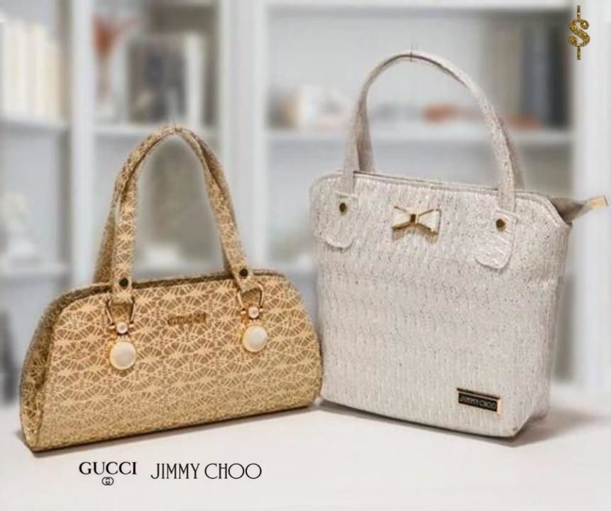 COMBO OF *CLUTCH* AND *HAND BAG*

BRAND- *GUCCI & JIMMY CHOO* *SHIMMER* MATERIAL  uploaded by Rakesh Textiles on 3/5/2021