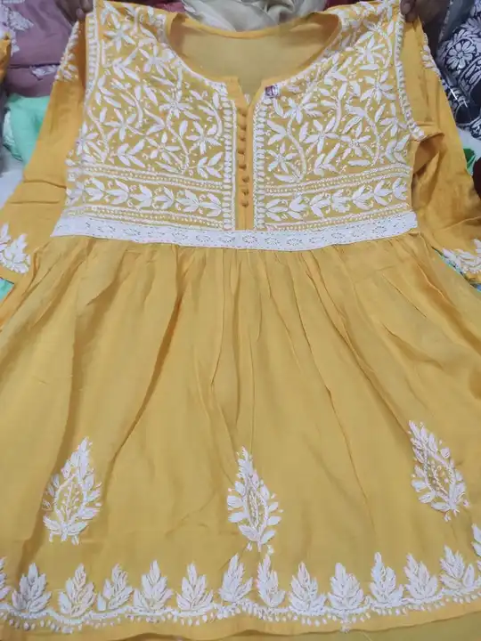 💐💐💐💐💐💐💐

**Lcf* *present* 🎁

Model  short kurti

30 approx length

Made by hand 
  ghas  Pat uploaded by Lcf crafts (lucknow Chikan factory) on 4/15/2023