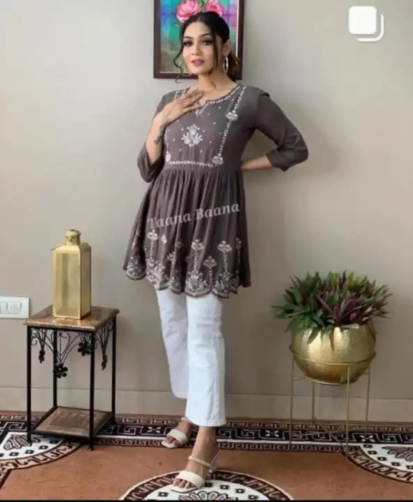 NEW LAUNCH ❤️❤️
    SUPERB QUALITY 
FABRIC RAYON 
💕💕 GET CASUAL WITH THIS PEMPLUM STYLE TOP WITH T uploaded by Mahipal Singh on 4/16/2023