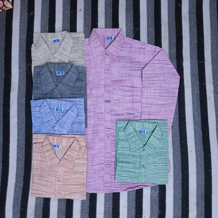 Khadhi shirt pure cotton  uploaded by HOTSHOTS @ FABRIC. GARMENTS MANUFACTURER LIMITED  on 4/16/2023