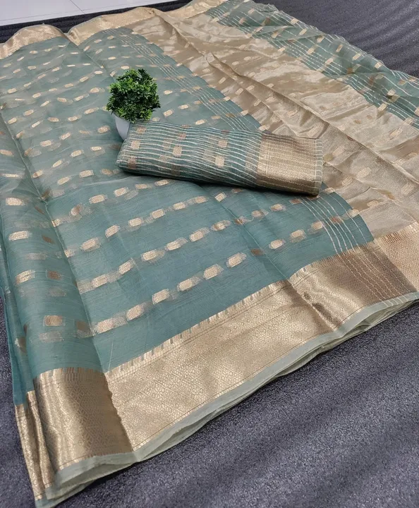 

SAREE - SOFT ORGANZA SILK
[ beautiful jacquard weaving border and all over jacquard weaving butti  uploaded by business on 4/16/2023