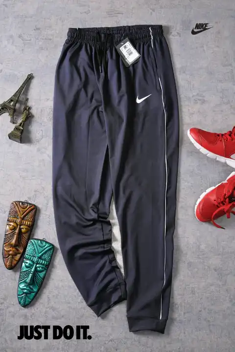 Nike Swoosh Cuffed Sweatpants in Black for Men  Lyst
