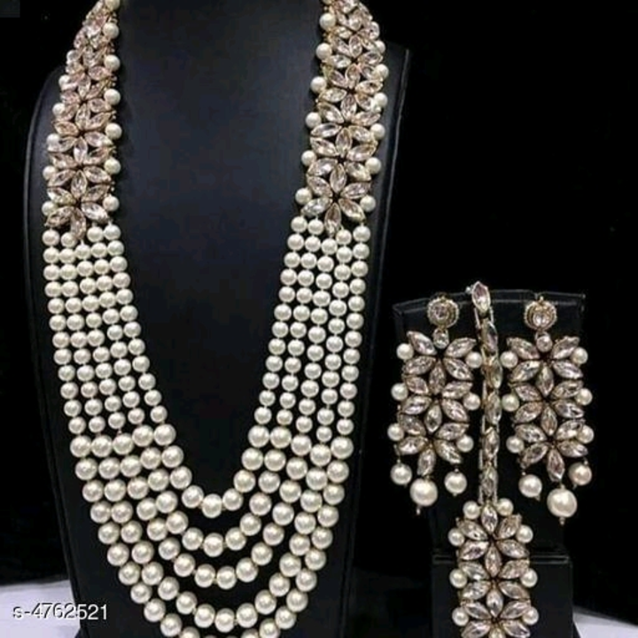 Post image Catalog Name:*Women's Alloy Gold Plated Jewellery Set*
Base Metal: Alloy
Plating: Gold Plated
Stone Type: Kundan / Pearls
Sizing: Adjustable
Type: Necklace Earrings Maangtika
Net Quantity (N): 1
Dispatch: 1 Day

*Proof of Safe Delivery! Click to know on Safety Standards of Delivery Partners- https://ltl.sh/y_nZrAV3