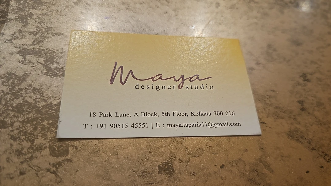Visiting card store images of Maya designer studio