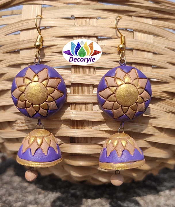 Terracotta banamali jhumka golden and violet colour  uploaded by Decoryle on 4/22/2023