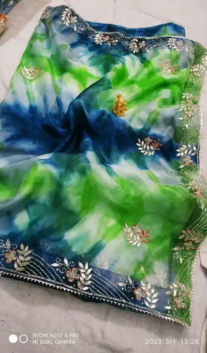 New launched⚡⚡⚡
This ❄⛄Summer Special Organza  Handwork Sarees

⚡organza Soft Fabric in Beautiful pa uploaded by Gotapatti manufacturer on 4/23/2023