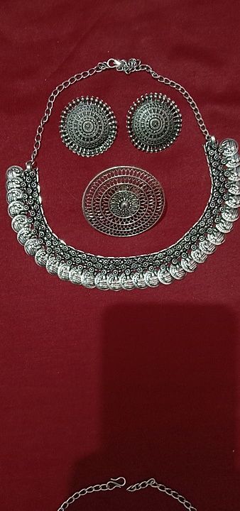 Oxidised combo set of necklace with Earrings and ring.Shipping will additional.whatsapp  uploaded by business on 7/11/2020