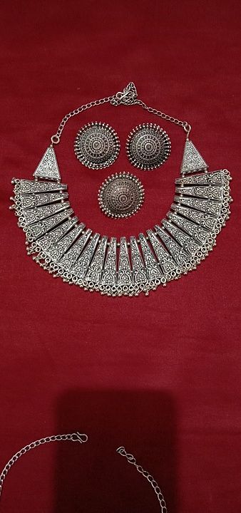Oxidised combo set of necklace with Earrings and ring.Shipping will additional.whatsapp  uploaded by business on 7/11/2020