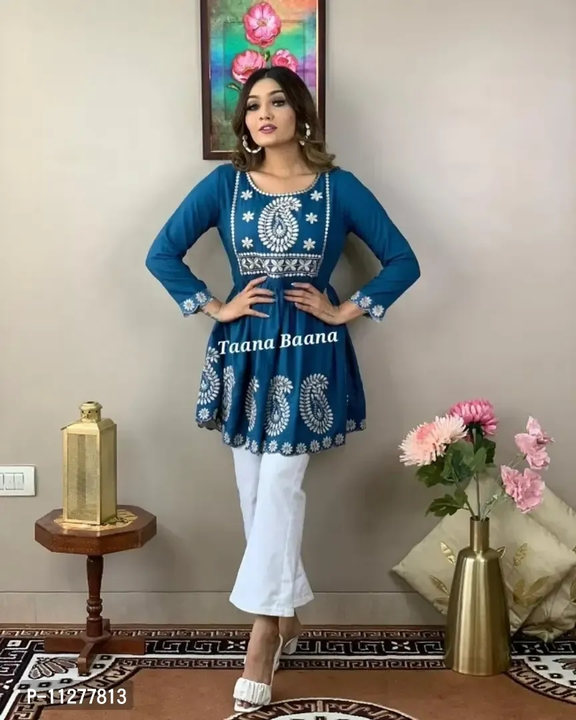 Stylish Blue Rayon Embroidered Short Kurta with Pant Set For Women
 uploaded by Raaz Shop on 4/26/2023