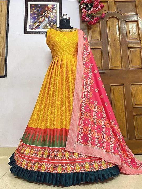 Post image *♥️VRINDA COLLECTION PRESENTING NEW DESIGNER  PRINTED GOWN♥️*

*♥️ GOOD QUALITY PATOLA PRINTED CREPE SILK OUTFIT*

*FABRIC DETAILS:-*

*👉 GOWN* :*HEAVY BUTTER SILK WITH PATOLA PRINT*(FULLY STITCHED)  with 3 mtr Flair
*👉🏻DUPATTA* : *HEAVY SOFT BUTTER SILK
*👉🏻 INNER* : SILK
*EXTRA SHORT SLEEVE AVL INSIDE GOWN*
# SIZE DETAILS:

👉 Gown Fullystitched up to 44 Size
👉🏻 Gown length 54 inch

*RATE:1200/-₹*

*READY TO SHIP*

DM us for orders &amp; more info! Please double tap &amp;  follow my page @navinbabaria &amp; FB page @collectionvrinda
