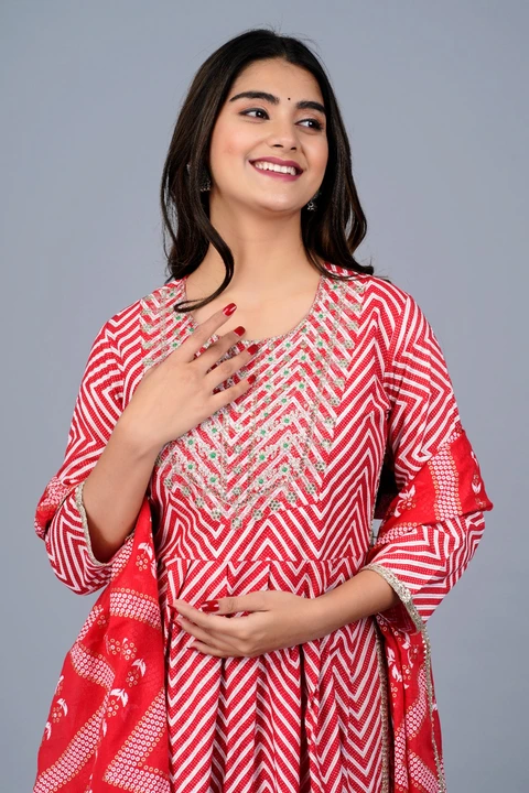 Red Nayra cut three piece suit with printed dupatta uploaded by DHANVI ENTERPRISES on 4/30/2023