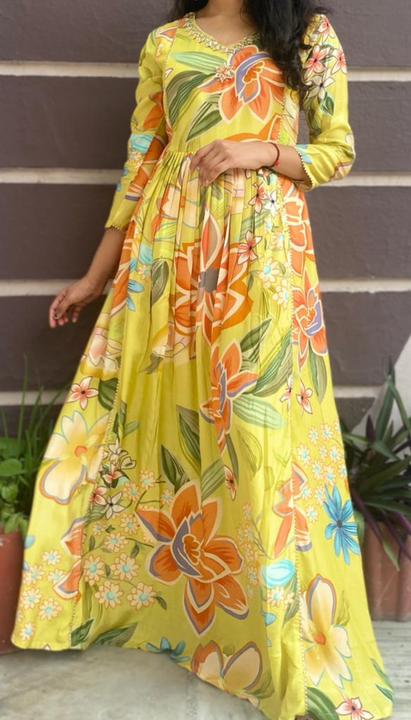 Floral gown with pleated front uploaded by business on 4/30/2023