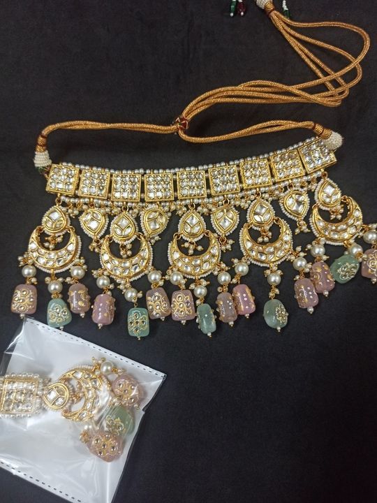 Post image Kundan choker set
Dm or whatsapp +918080595267 for order
#jewellery #kundanjewellery #earrings