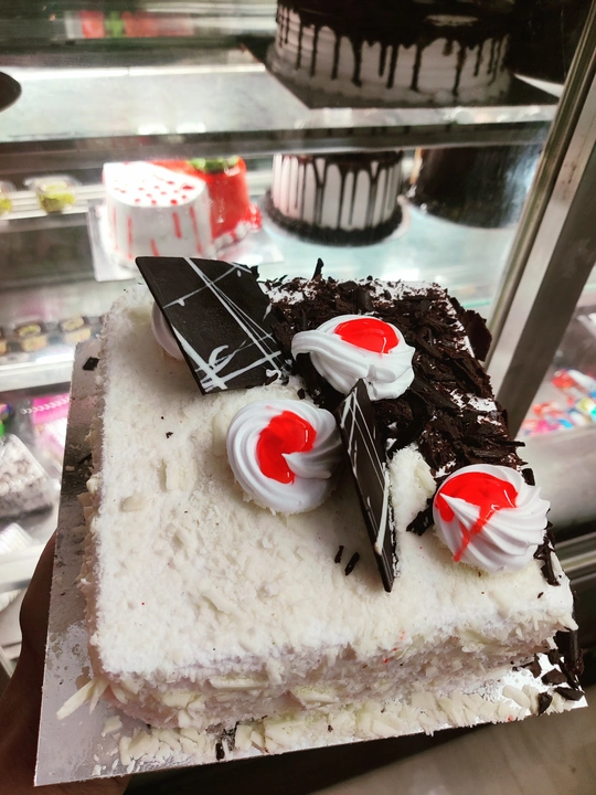 Vanilla chocolate cake uploaded by Cake shop on 5/29/2024