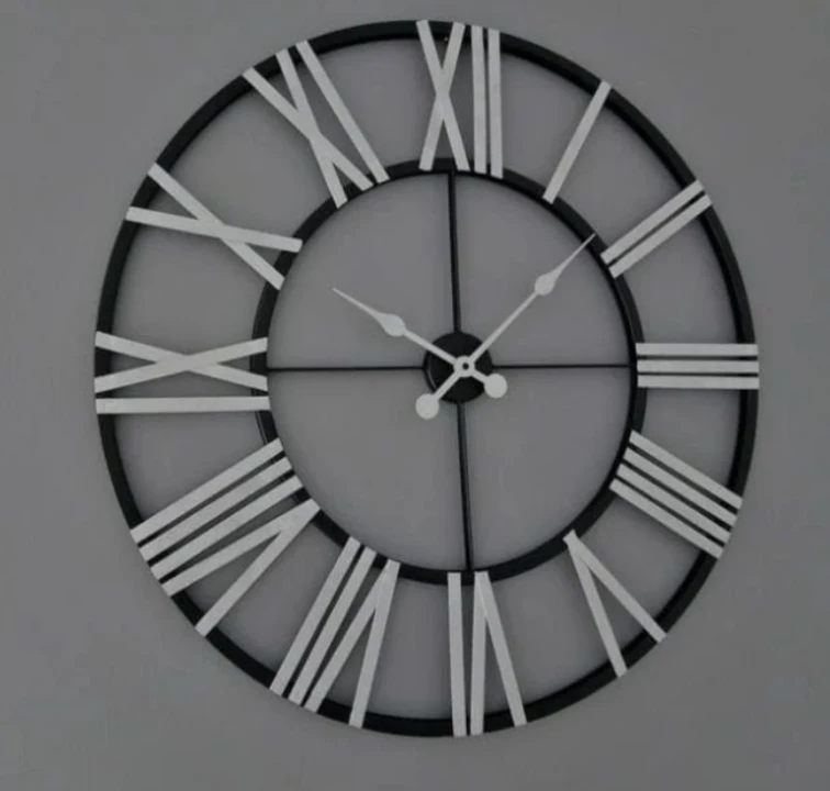 Metal wall clock  uploaded by business on 5/1/2023