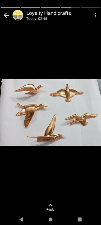 Metal wall hanging birds uploaded by business on 5/1/2023