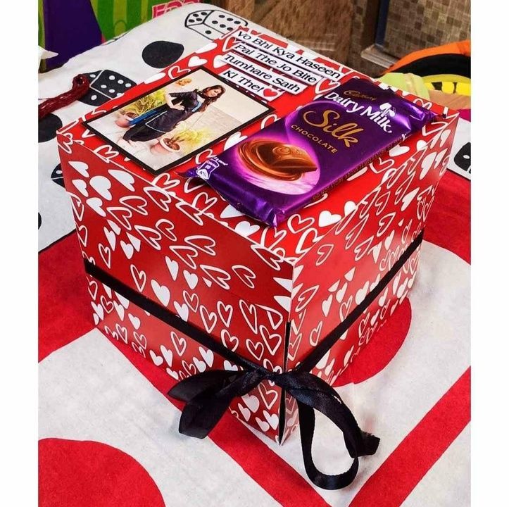 Post image Special Red Chocolates Explosion Box
Perfect for any gifting purpose
Featuring:-
8 Dairy milk
4 pictures
Cute teddy bear 
Some small Chocolates
Personalized message cards