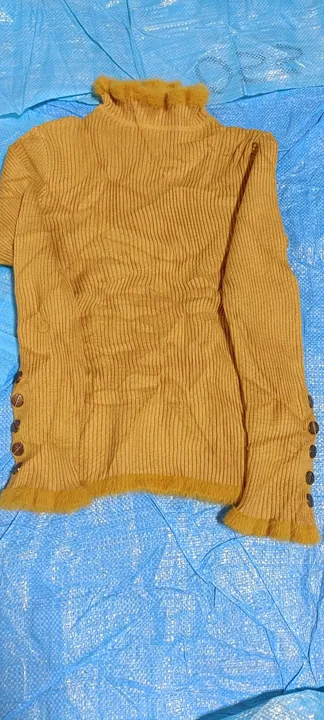Sweater top uploaded by business on 5/3/2023