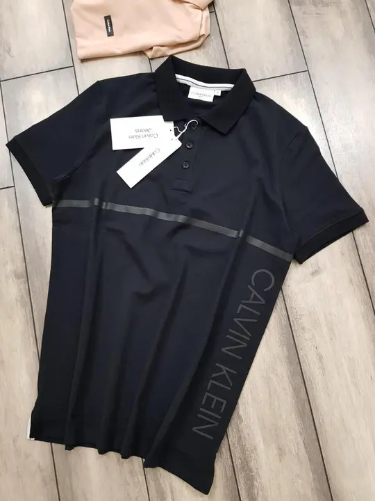 `LYCRA FINE POLOS Calvin Klein 
Premium Men’s Polo T-Shirts  uploaded by FASHION FOLDER on 5/4/2023