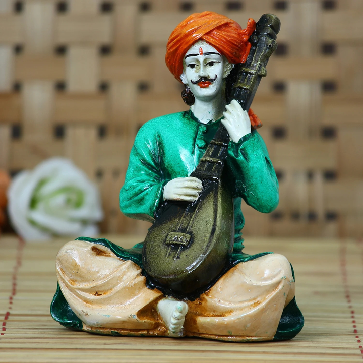 🪕........ Polyresin Rajasthani Men playing Sitar Musical Instrument Handcrafted Decorative Showpiec uploaded by Home decor on 5/5/2023